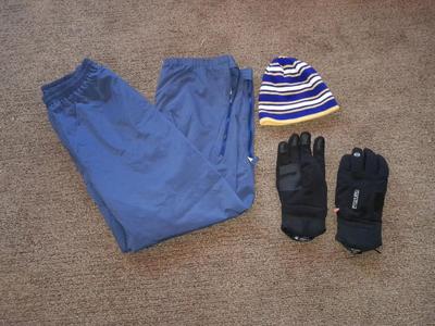 Winter wear, Gore-Tex Size XL snow pants with men's large gloves, and a beanie hat