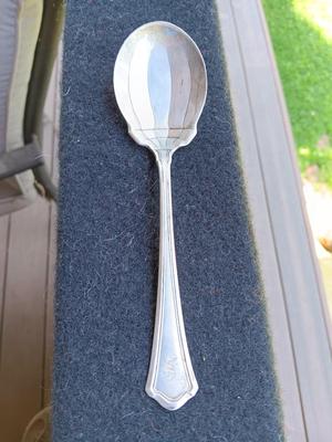 Sterling silver marked clam shaped spoon