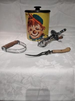 Vintage Ransburg Canister Cookie Metal Tin with vintage Kitchen Utensils
