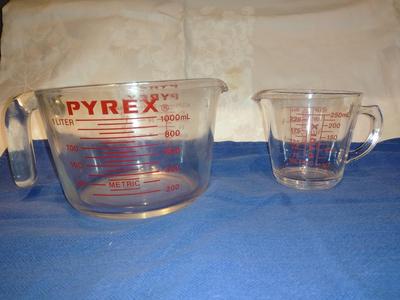 Two glass Pyrex measuring cups