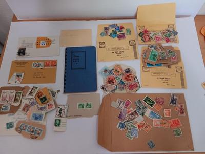 The Stamp book with stamps - and extra loose stamps too Postage stamp collection