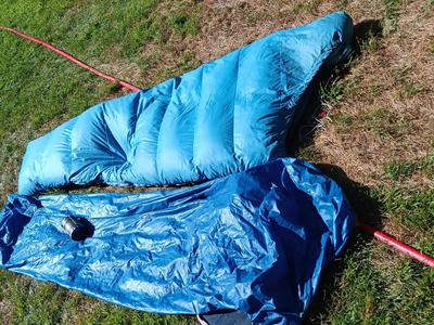 "Mummy bag" sleeping bag with cover and a Bell Howell lantern