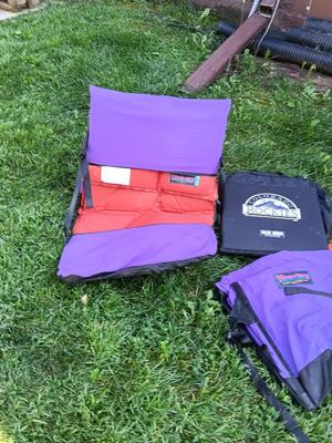 Two Therma-a- rest chairs and a Rockies stadium seat