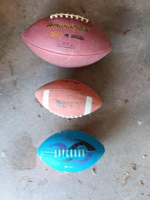 Three Footballs