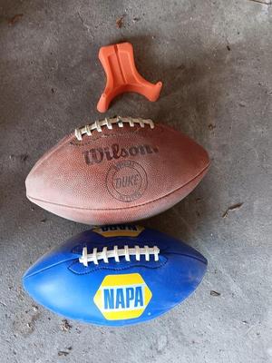 Two footballs and a kickoff tee- Wilson - Napa