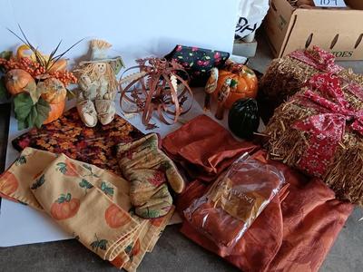 Fall Decorations for your home - pumpkins - scarecrow - tablecloth- miniature straw bales.