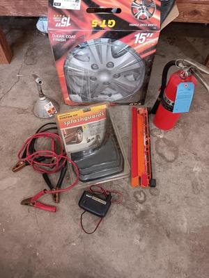Automobile items - Jumper cables- new mud flaps -Good fire extinguisher wheel covers and more