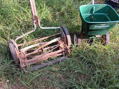 Vintage metal Push mower yard decor with Scott's easy green spreader