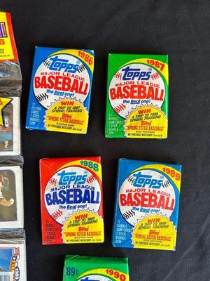 SEALED PACKAGES OF TOPPS BASEBALL TRADING CARDS