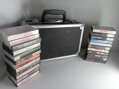 Great music on cassette tape - some classics!  with sturdy black handled case