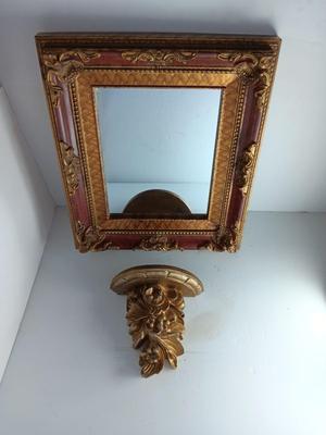 Decorative framed wall mirror with small Shelf