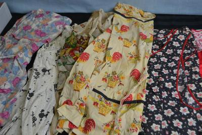 LOT 51 FOUR VINTAGE APRONS