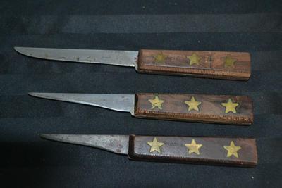 LOT 57. THREE VINTAGE FOSTER BROS KNIVES WITH STAR EMBOSSED WOOD HANDLES