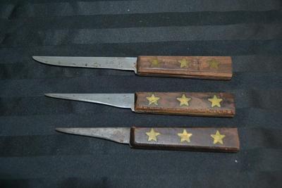 LOT 57. THREE VINTAGE FOSTER BROS KNIVES WITH STAR EMBOSSED WOOD HANDLES