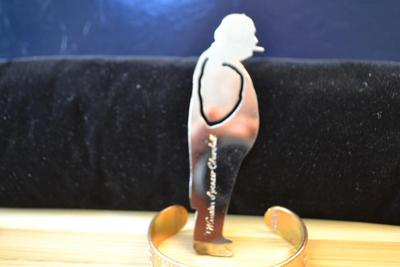 LOT 87 DISNEY COPPER BRACELET AND CHURCHILL BOOK MARK