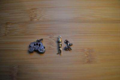 LOT 107 WAGON TRAIN AND MISC. CHARMS