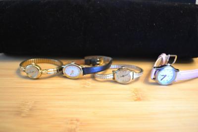 LOT 114. LADIES TIMEX WATCHES LOT OF FOUR