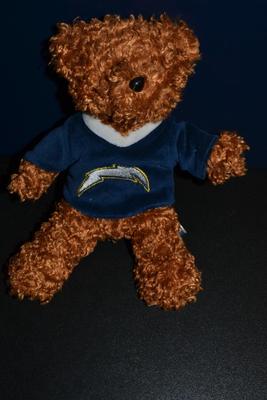 LOT 141.  PADRES AND SAN DIEGO CHARGERS PLUSH BEAR