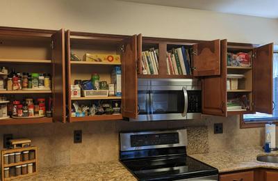 Contents of Upper Kitchen Cabinets (South)