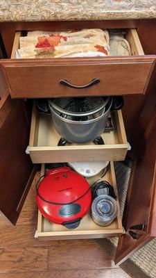 Contents of Lower Kitchen Cabinets (West)