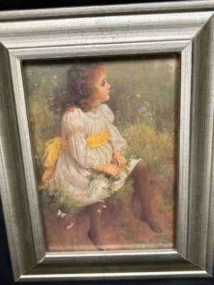 Framed Art Print Victorian Girl Sitting on Grassy Ledge