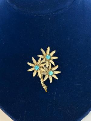 Vintage Gold Tone Flower Pin Enameled Petals with Bright Blue Rhinestone Center