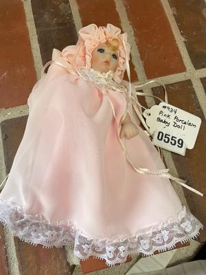 Pink porcelain baby doll