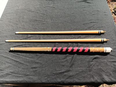 Vintage red and black pool cue with pearl white dots - turns into 2 different sizes