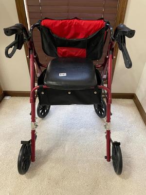 Red walker with seat