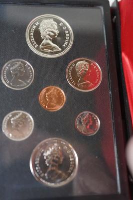 ROYAL CANADIAN MINT SET IN BOOK W /RED SATIN LINING.