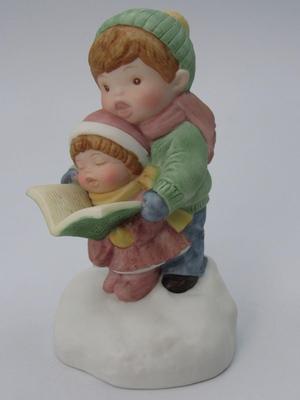 Vintage Avon Joy to the World Musical Hand Painted Porcelain Caroler Figurine with Box