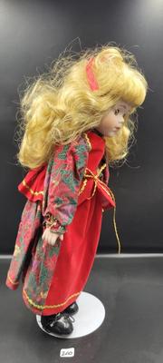 Porcelain Doll in Green and Red