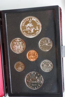 ROYAL CANADIAN MINT SETS (4) 1977, 1975, 1978, 1973 IN RED SATIN LINED PRESENTATION BOOKS,