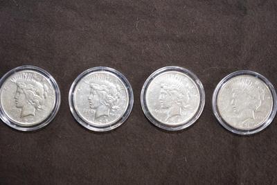 PEACE SILVER DOLLAR COLLECTION 1920'S /30'S  -TEN IN A PRESENTATION BOX & PLASTIC CASES.