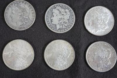 GROUPING OF SIX  MORGAN DOLLARS. 1870's and 1880's dates