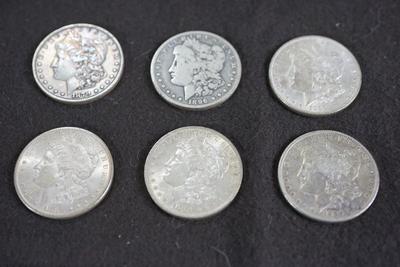 GROUPING OF SIX  MORGAN DOLLARS. 1870's and 1880's dates