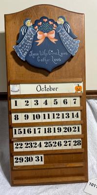 Wood calendar with storage