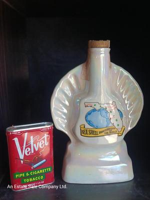 Jim Beam Florida seashell decanter with vintage Velvet tobacco tin