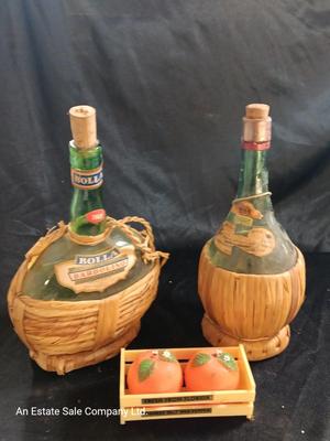Two wicker covered Italian alcohol bottles with Florida Oranges salt & Pepper shakers