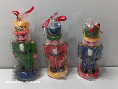 Three Nutcracker Decorative colored candles