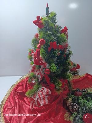 Faux Christmas tree with ornaments and bows - tree skirt and Plastic greenery