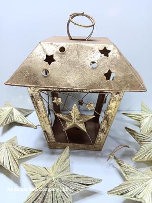 Tin Star themed candle lantern with glittery vintage plastic star ornaments