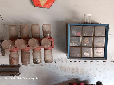 Two hardware organizers with some hardware