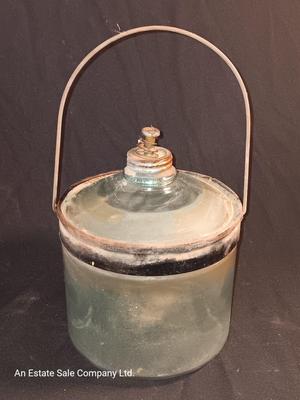 Antique glass kerosene jug by Cleveland Metal Products