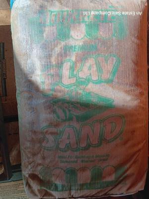 Seven bags of playground sand 50lbs each bag