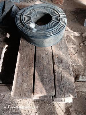 Six landscape timers and a roll of lawn and garden edging