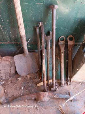 Antique tools - handmade post pounder - prybars - and an assortment of other steel tools