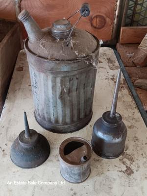 Galvanized metal oil can and smaller oil cans and gas measuring tin