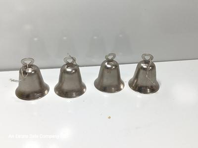 Four working metal bells
