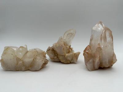 Three (3) Quartz Crystals